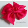 Barrette à gros noeud rouge